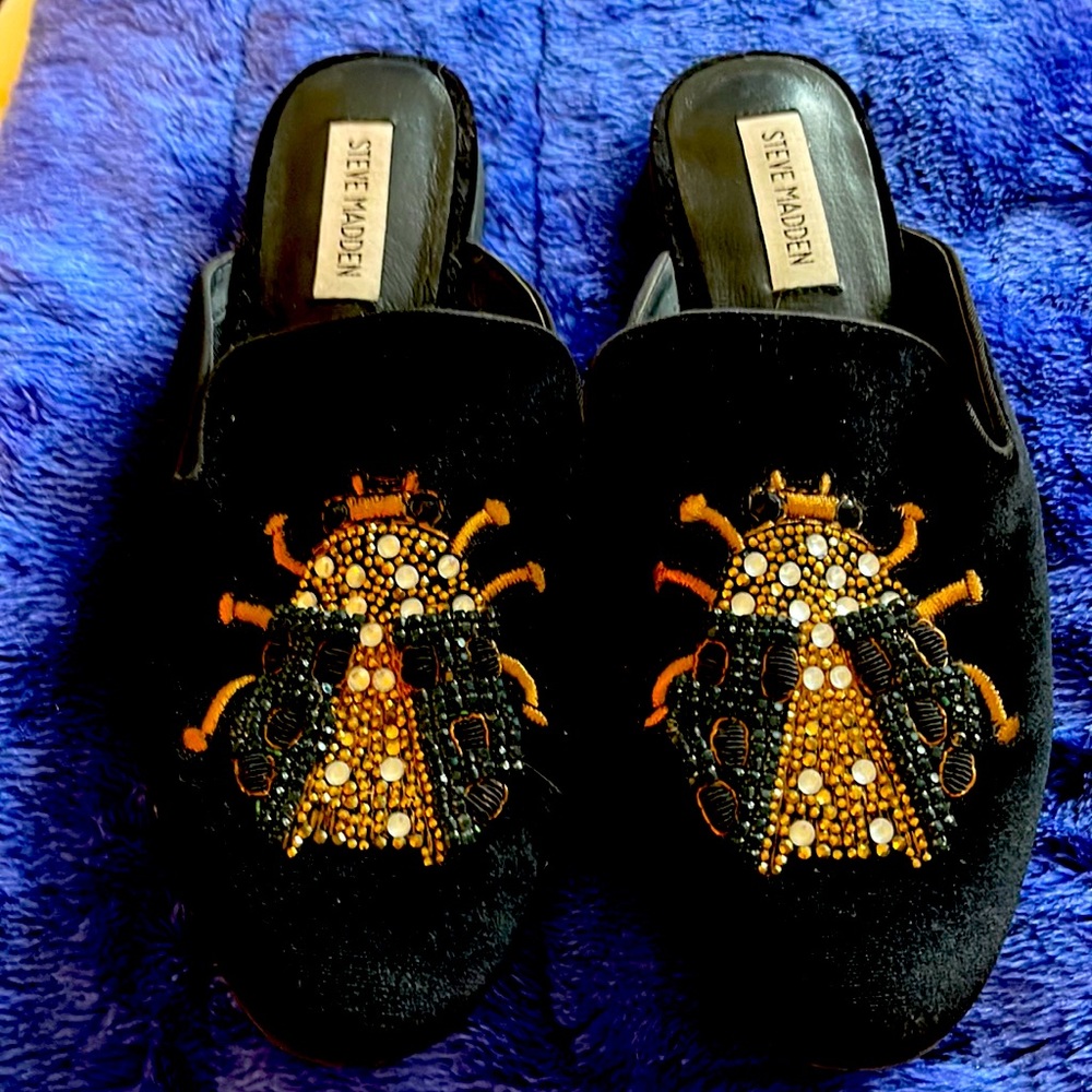 Steve Madden slip on mules Size 8 1/2. Black suede with beaded ladybug.